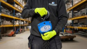 Industrial Lifting Engineer holding a Chain Block